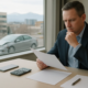 Denver car accident medical liens and settlement documents on a professional review table
